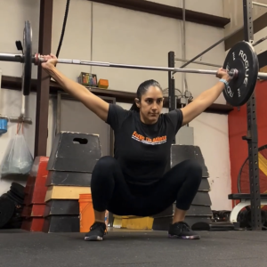 Personal Training owner overhead squatting